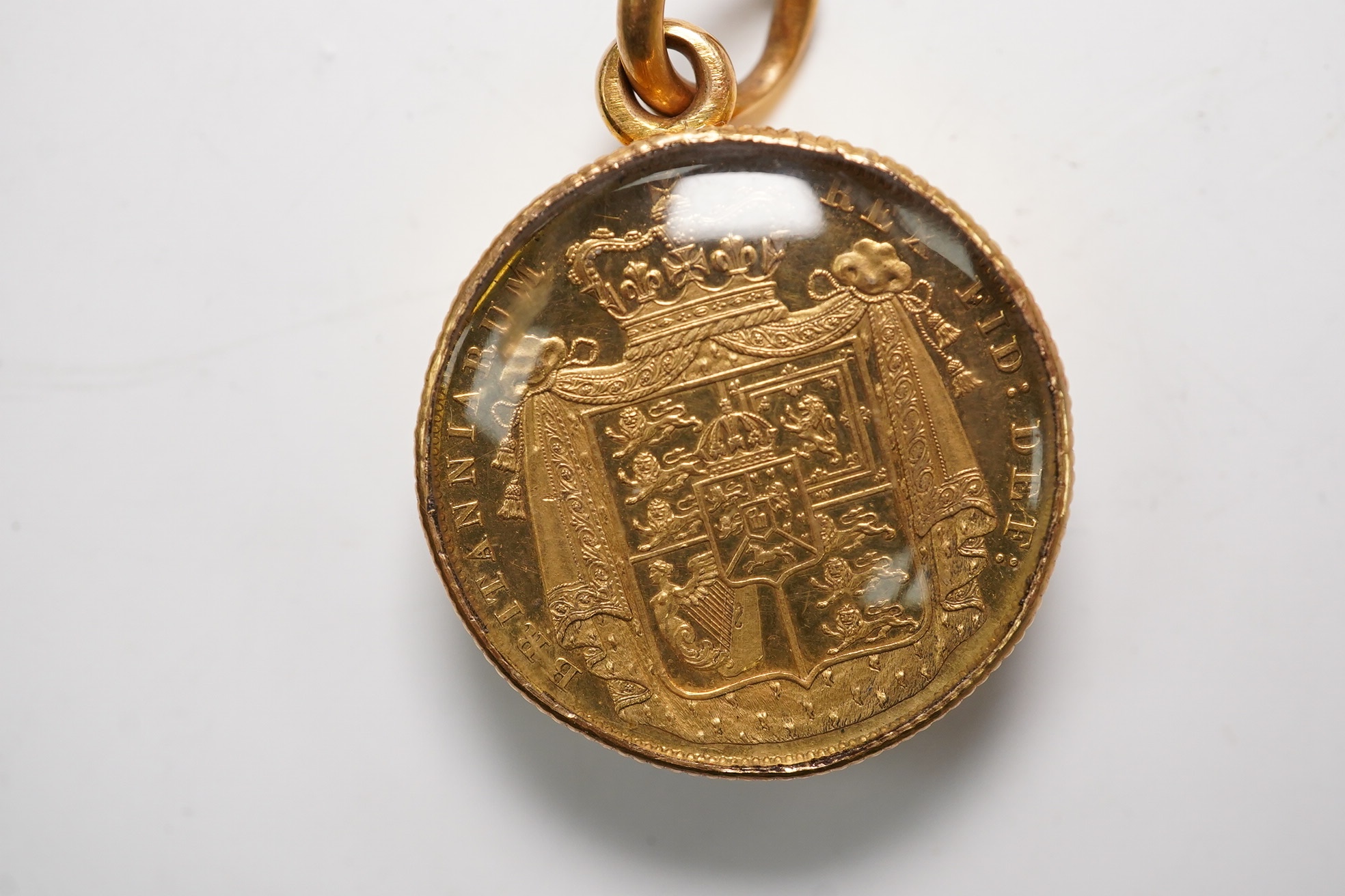 A small group of assorted jewellery including a coral necklace, 9c compass fob, five yellow metal items including a ring, locket and brooch and a stick pin. Condition - poor to fair
